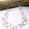 Random links of hammered sterling silver make the Asterope Half Double Necklace